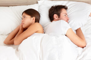 Unhappy couple needing Couples Conflict Resolution Chicago